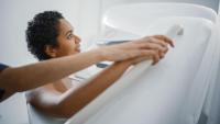 A patient getting a breast mammography